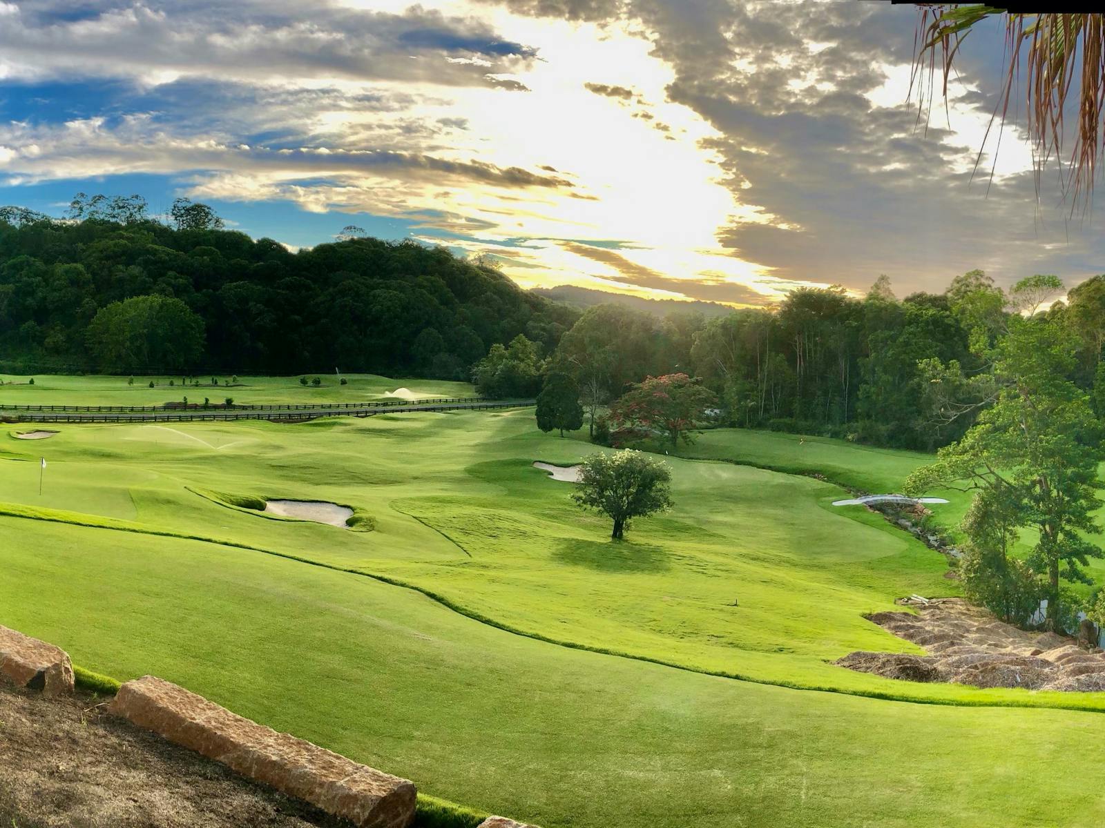 Teven Valley Golf Course with green fairways at sunset